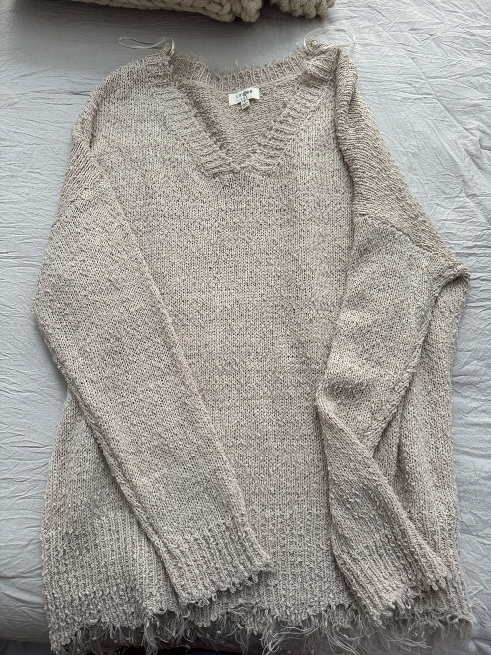 Umgee Cream V-Neck Fringe Hem Sweater
